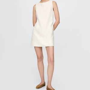 Elegant Cream Sleeveless Dress